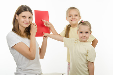 Image showing Funny kids guess the color of picture shown mum