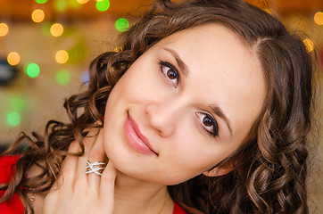 Image showing Portrait of dreaming young girl in a Christmas setting