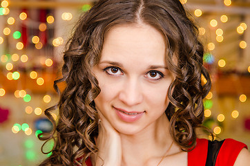 Image showing Portrait a girl on background of blurred lights