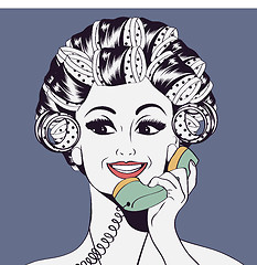 Image showing Woman with curlers in their hair talking at phone