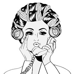 Image showing Woman with curlers in their hair talking at phone