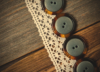 Image showing vintage buttons and antique lace close up