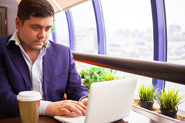 Image showing businessman check his email on the computer