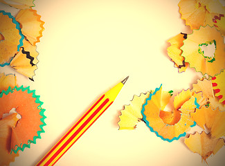Image showing striped pencil and colored shavings