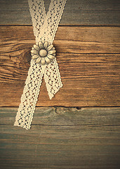 Image showing buttons flowers and lace tape
