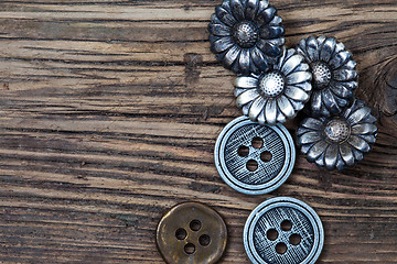 Image showing several vintage metal buttons