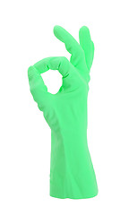Image showing Hand gesturing with green cleaning product glove