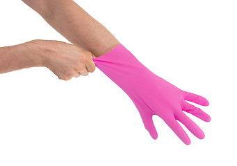 Image showing Hand in pink glove