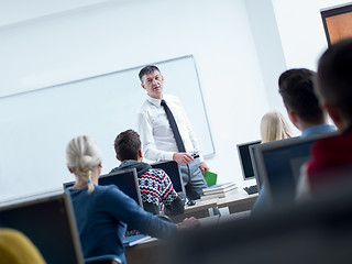 Image showing students with teacher  in computer lab classrom