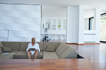 Image showing Portrait of senior man relaxing in sofa