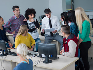 Image showing students with teacher  in computer lab classrom