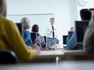 Image showing students with teacher  in computer lab classrom