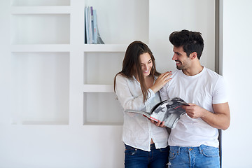 Image showing relaxed young couple at home staircase