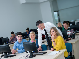 Image showing students with teacher  in computer lab classrom