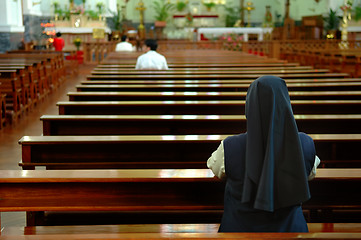 Image showing Praying sister