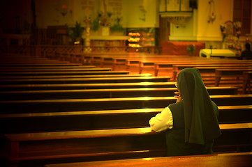 Image showing Praying sister