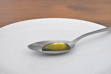 Image showing Spoon with olive oil