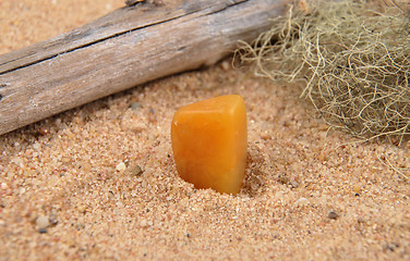 Image showing Orange calcite on beach