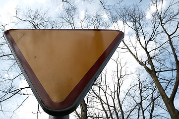 Image showing Yield sign against the sky.