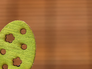 Image showing Easter decoration - green wooden egg.