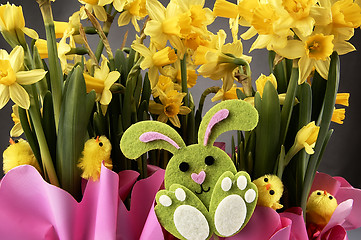 Image showing Easter bunny and yellow daffodils.