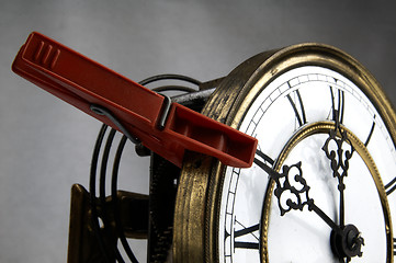 Image showing Clothespin stop the clock.