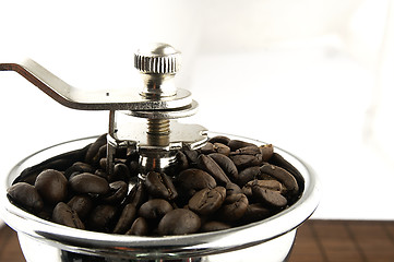 Image showing Coffee grinder on the table.