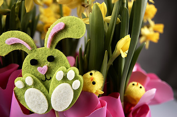 Image showing Easter bunny and yellow daffodils.