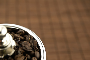 Image showing Coffee grinder on the table.