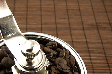 Image showing Coffee grinder on the table.