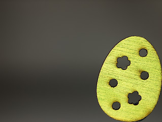 Image showing Easter decoration - green wooden egg.