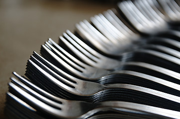 Image showing Forks on the kitchen counter.