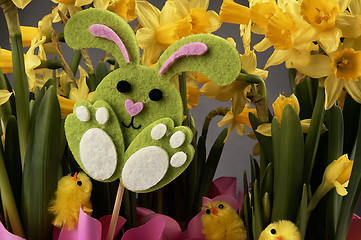 Image showing Easter bunny and yellow daffodils.