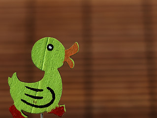 Image showing Easter decoration - green wooden duck.