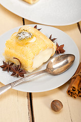 Image showing cream roll cake dessert and spices 