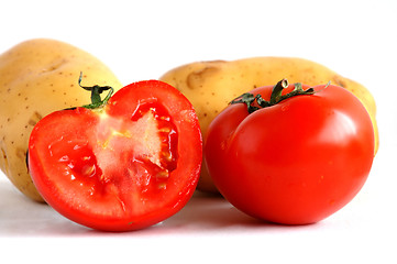 Image showing Potatoes and sliced tomatoes (1)