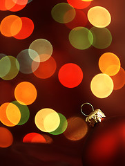 Image showing Red Christmas Tree bauble and magic bokeh.