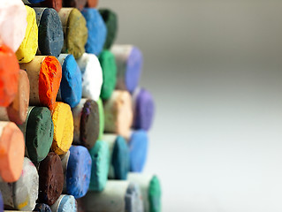 Image showing Colored dry pastel crayons closely.