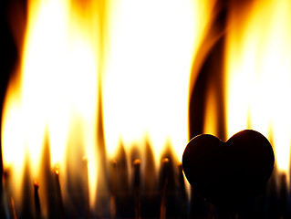 Image showing Flaming heart on a black background.