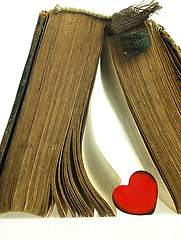 Image showing Heart and old closed the book with a damaged cover.