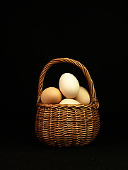 Image showing Easter eggs in a wicker basket.