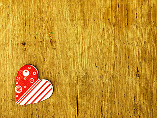 Image showing Wooden heart on the oak table.