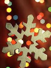 Image showing Huge snowflake and magic bokeh.