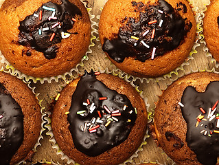 Image showing Muffins with chocolate icing.