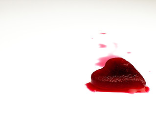 Image showing Red heart-shaped ice in the blood.