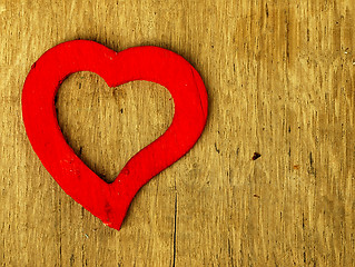 Image showing Wooden heart on the oak table.