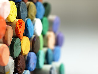 Image showing Colored dry pastel crayons closely.