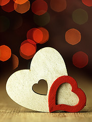 Image showing Heart\'s on a wooden boards background.