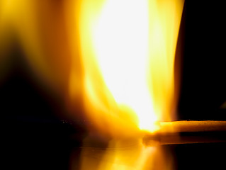 Image showing Burning match on a black background.