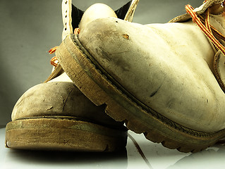Image showing Pair of old, worn heavy boots.